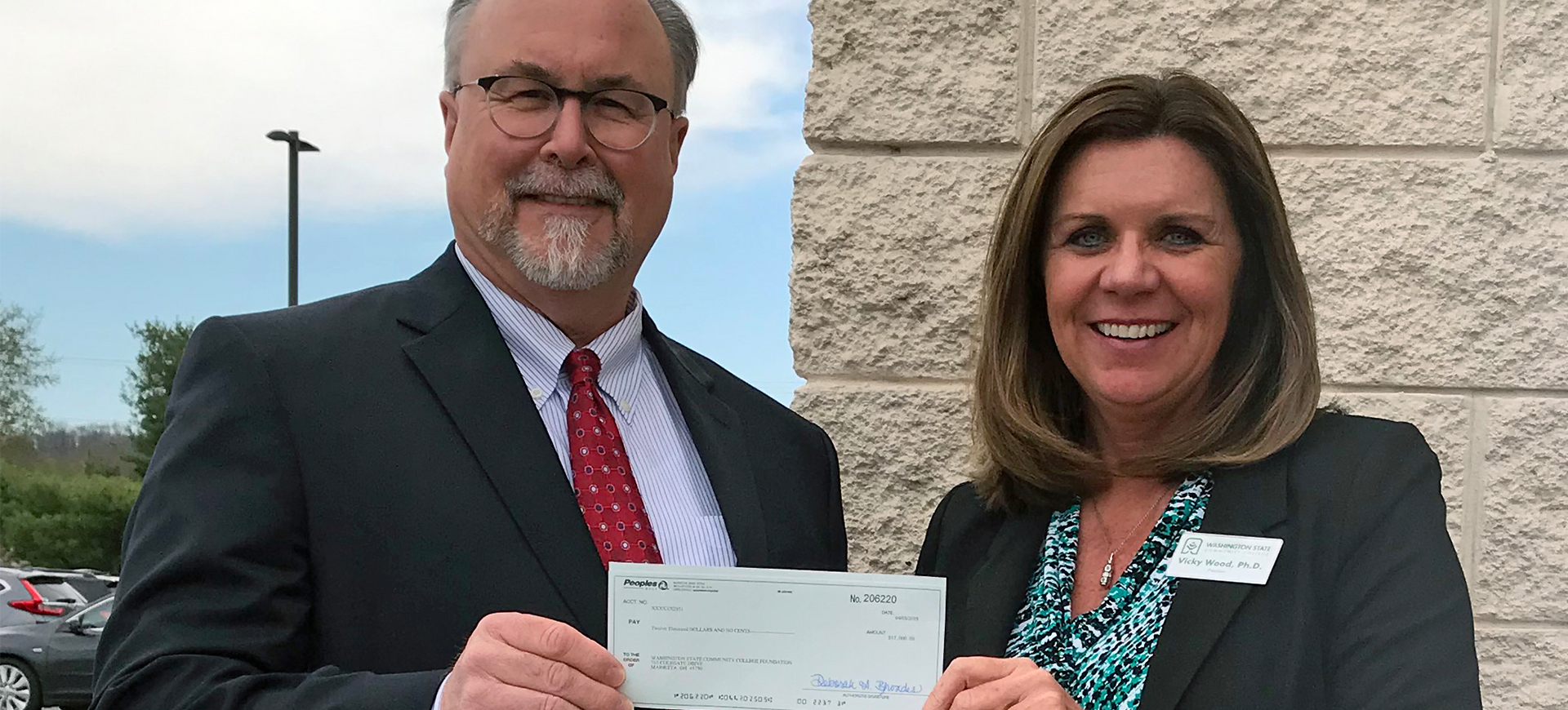 Peoples Bank recently donated $12,000 to the Washington State Community College Foundation in support of scholarships. Shown are (from left to right) WSCC Board of Trustees member Randall Barengo and WSCC President Dr. Vicky Wood accepting the contribution.
